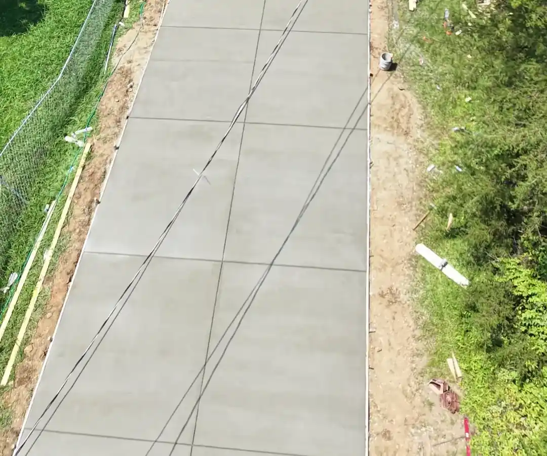 Overhead view of a freshly finished concrete driveway in Mount Holly