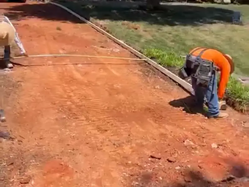 Red clay graded and formed for a concrete driveway replacement